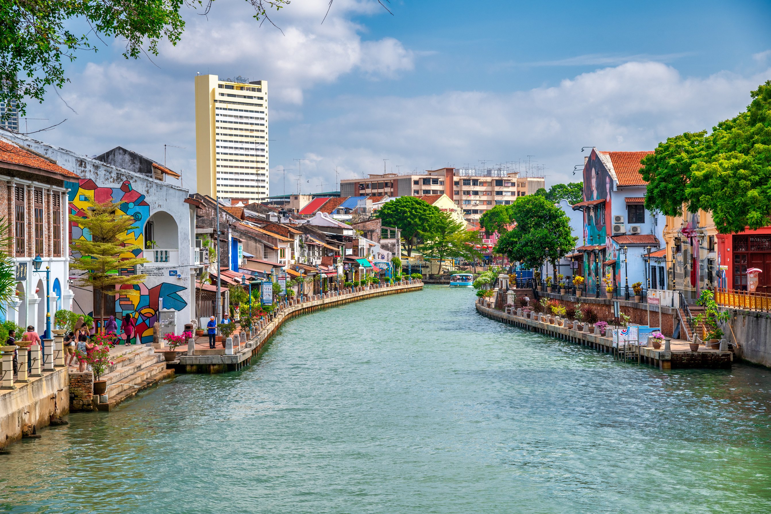 MALACCA, MALAYSIA - DECEMBER 29, 2019: Tourists along the Melaka